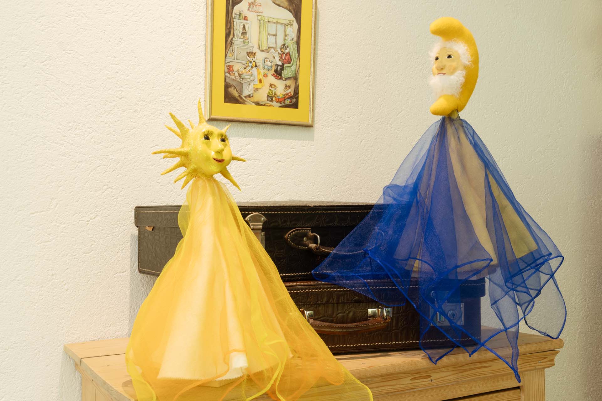 Mond und Sonnefigur.